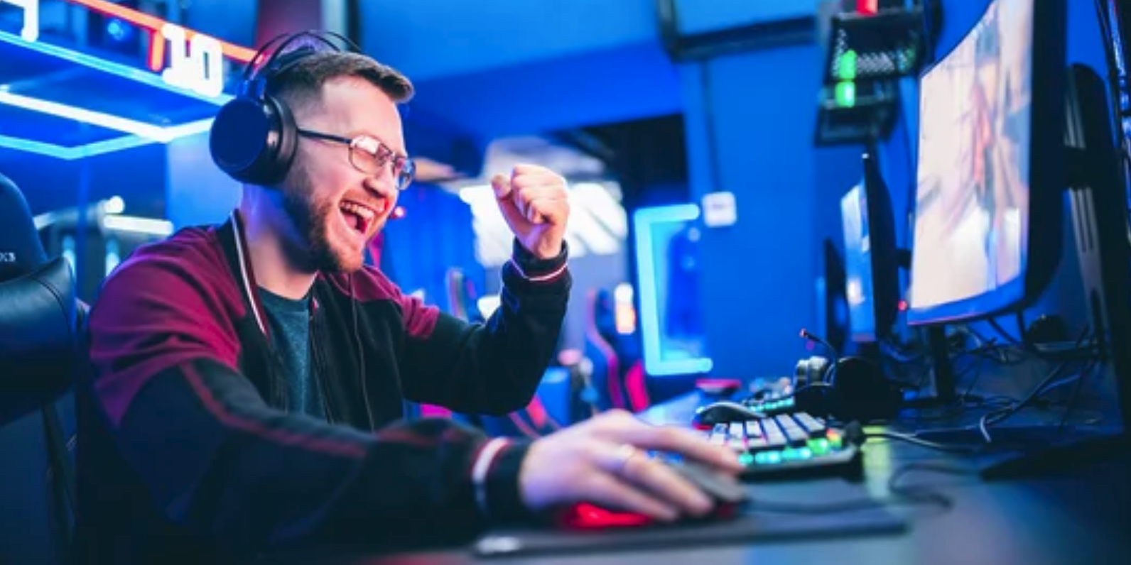 Man at elaborate computer gaming system