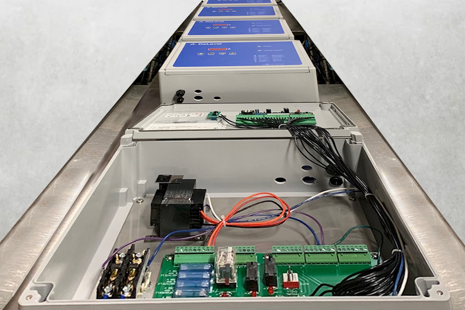 Line of completed box builds ready to ship